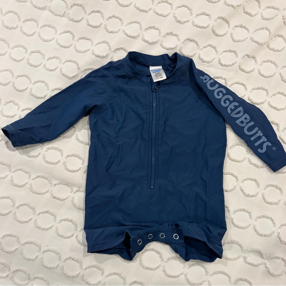 Like new RuggedButts Boys' Navy Long Sleeve One Piece Rash Guard